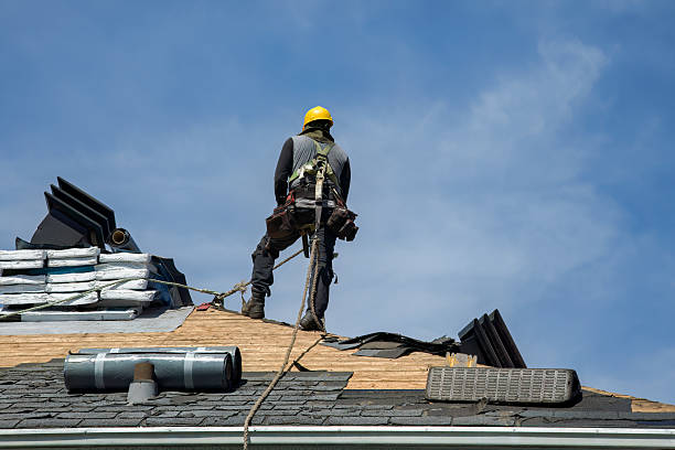 Professional Roof Replacement technician working in Houston, AK
